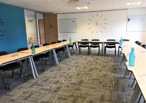 A conference-style meeting room at the Warrington Road virtual office location, near Manchester.